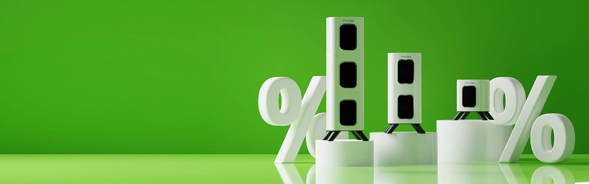 air purifiers and white 3D percentage symbols on a green background