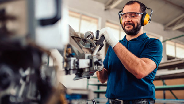 Man Operating Angle Grinder