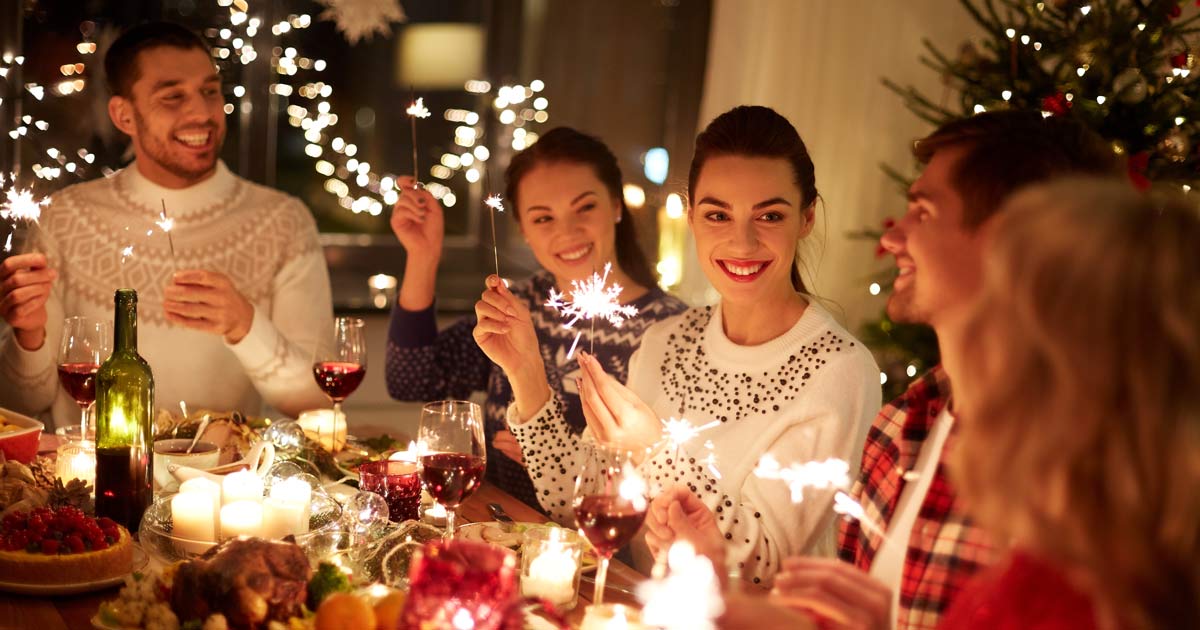 Family gathered around a holiday table