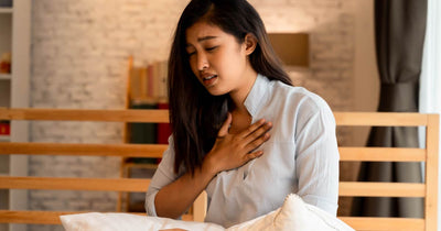 Woman having difficulty breathing