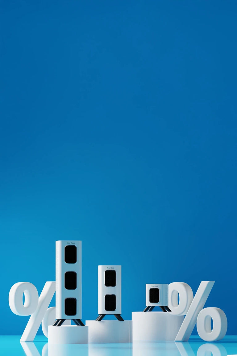 white air purifiers on pedestals with percent signs on either side 